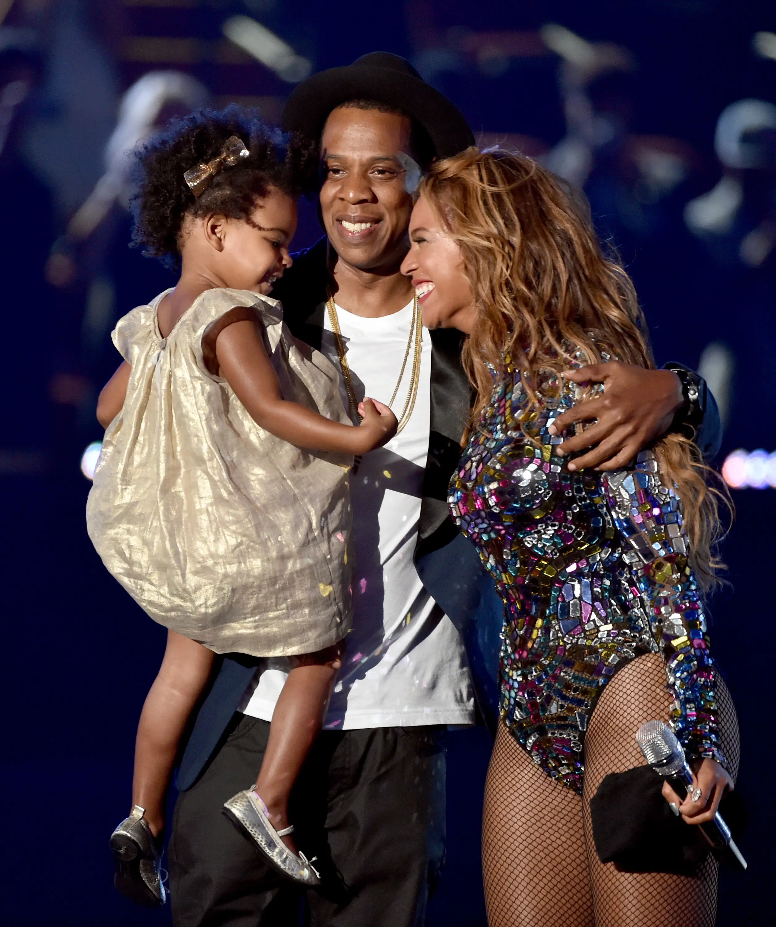 Jay-Z and Beyoncé with their daughter, Blue Ivy, onstage at the 2014 VMAs.