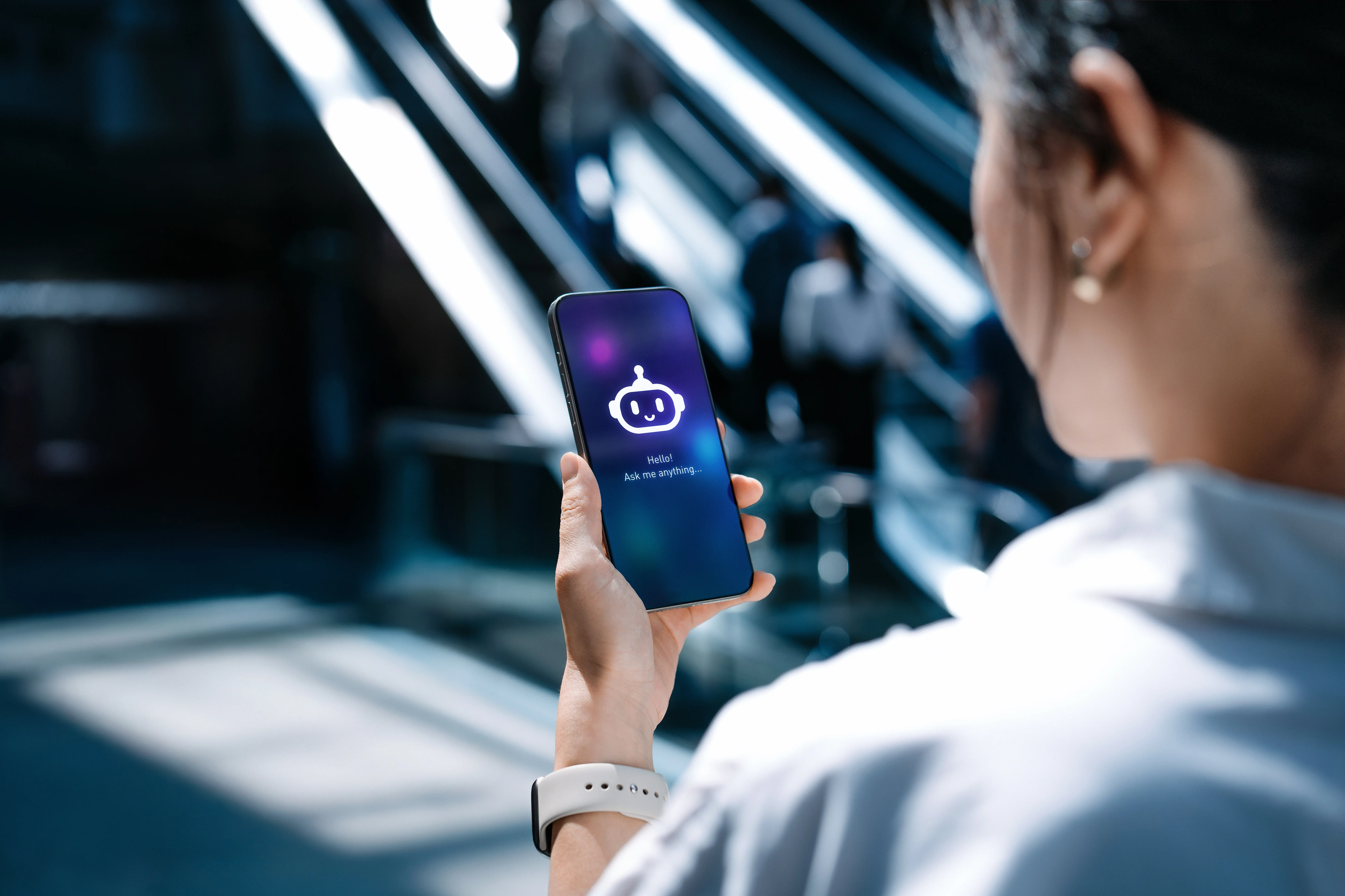 Asian woman with a virtual assistant