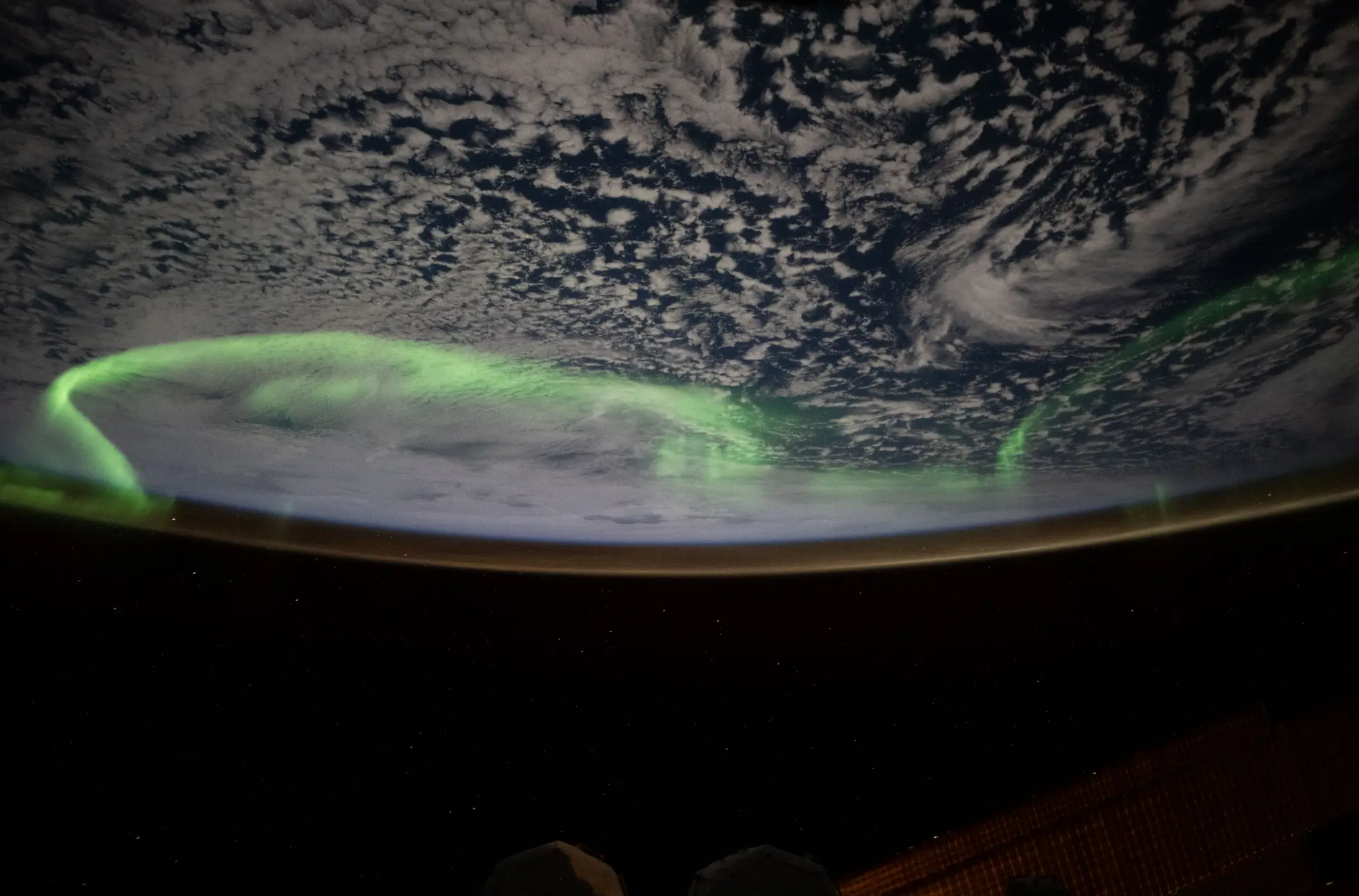 The northern lights seen above a cloudy Indian Ocean as the ISS soared above Australia and Antartica.