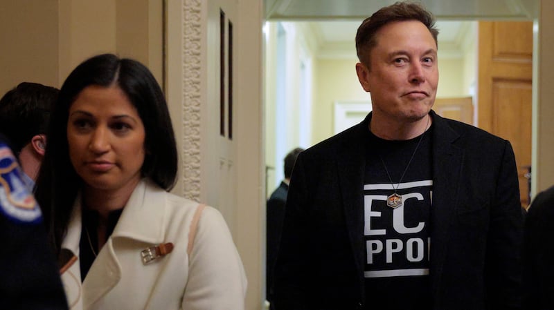 Elon Musk accompanied by DOGE adviser Katie Miller (left) leave a meeting with Senate Republicans on March 05, 2025.