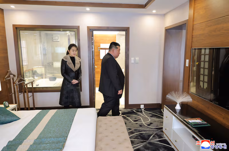 This picture taken on December 20, 2025 and released by North Korea's official Korean Central News Agency (KCNA) via KNS on December 23, 2025 shows North Korean leader Kim Jong Un (L) and his daughter Ju Ae inspecting the Ikkal Hotel, which was recently completed in the Samjiyon tourist district of Ryanggang Province. (Photo by KCNA VIA KNS / AFP via Getty Images) / South Korea OUT / ---EDITORS NOTE--- RESTRICTED TO EDITORIAL USE - MANDATORY CREDIT 