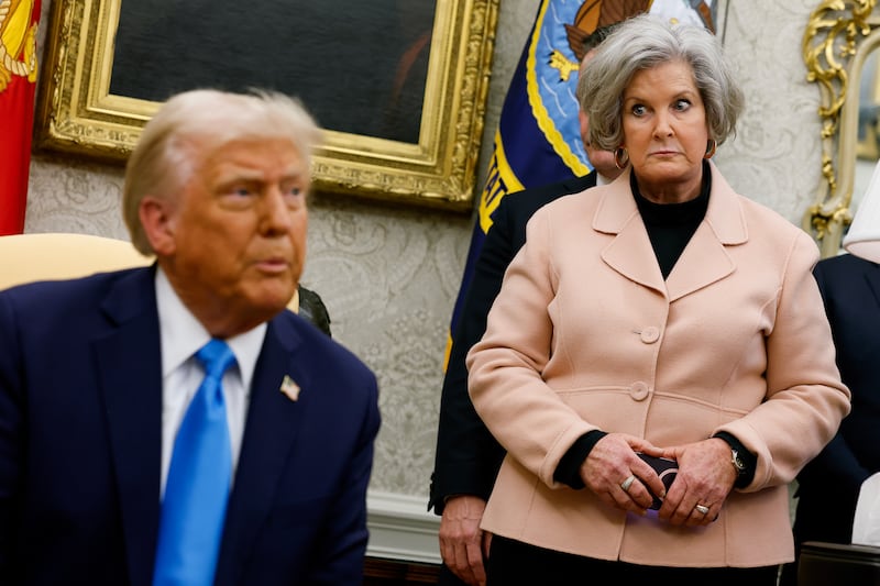 President Donald Trump, accompanied by White House Chief of Staff Susie Wiles (R), in the Oval Office of the White House on February 04, 2025 in Washington, DC.