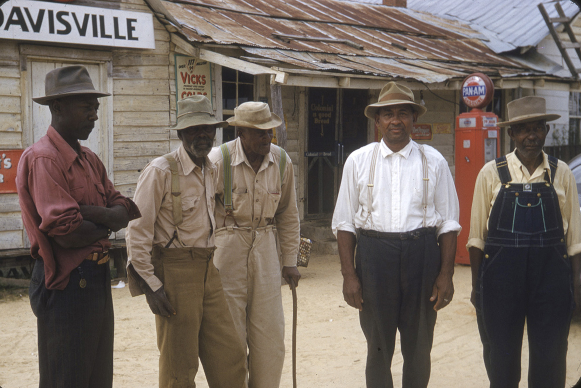 Older Black men included in a syphilis study stand for a photo.