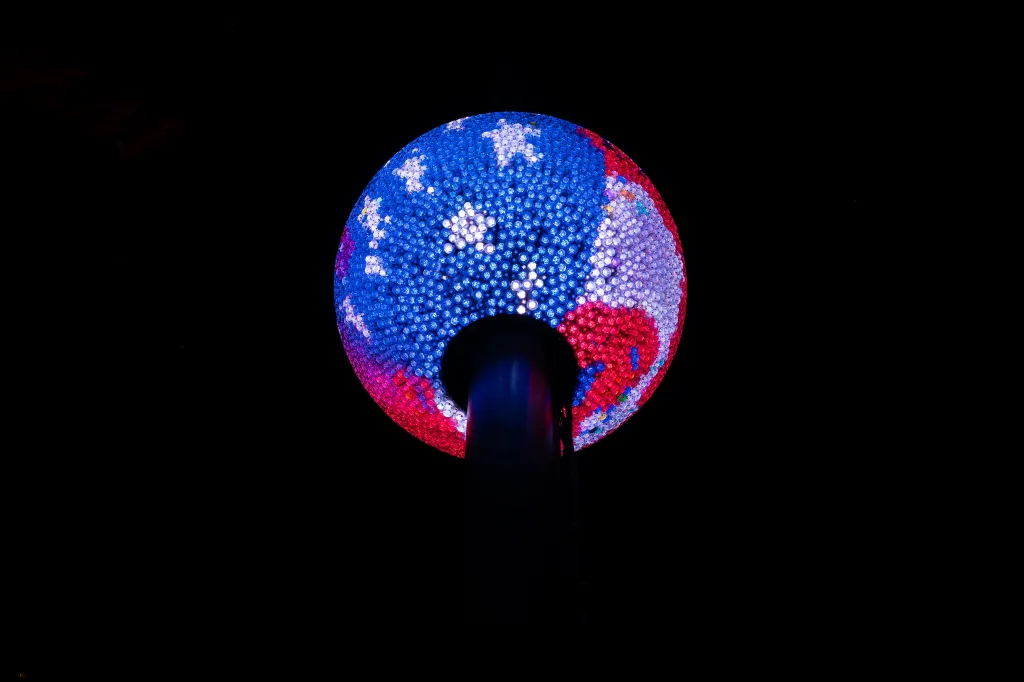 America250 Flag Ball Design at night.
