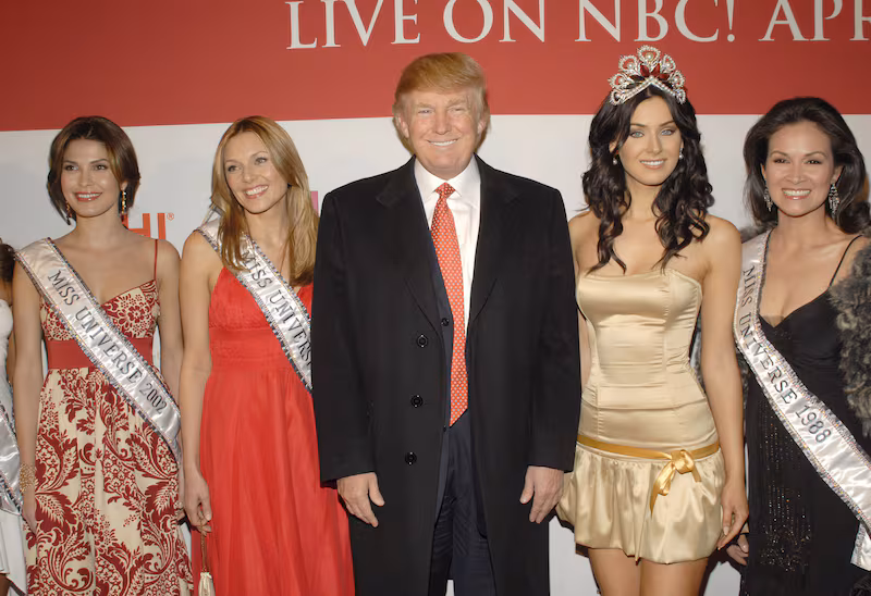 Donald Trump with former Miss Universes and the current Miss Universe, Natalie Glebova