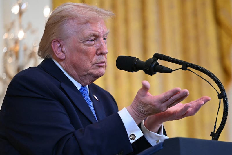 President Donald Trump speaks at a Hanukkah reception in the East Room of the White House in Washington, DC on December 16, 2025.