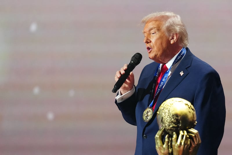 President Donald Trump delivers a speech after receiving the FIFA Peace Prize during the draw for the 2026 FIFA World Cup at the Kennedy Center, in Washington, D.C. on December 5, 2025.
