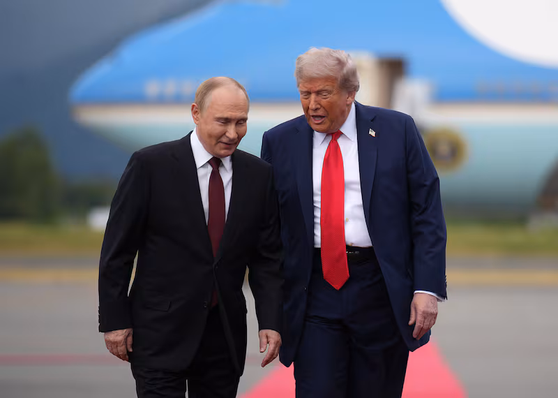 ANCHORAGE, ALASKA - AUGUST 15: U.S. President Donald Trump (R) walks with Russian President Vladimir Putin as they arrives at Joint Base Elmendorf-Richardson on August 15, 2025 in Anchorage, Alaska. The two leaders are meeting for peace talks aimed at ending the war in Ukraine.  (Photo by Andrew Harnik/Getty Images)