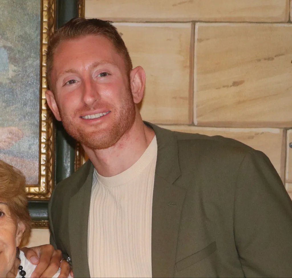 Brandon Billmaier is 6-foot-2 and has strawberry hair and brown eyes.