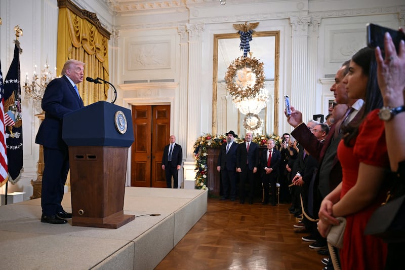 Trump addresses attendees at a Hanukkah reception