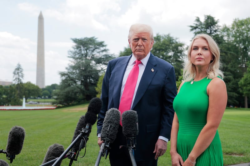WASHINGTON, DC - JULY 15: U.S. President Donald Trump, joined by White House Press Secretary Karoline Leavitt, speaks to the media as he departs the White House on July 15, 2025 in Washington, DC. Trump is traveling to Pittsburgh, Pennsylvania, to speak at an artificial intelligence and energy summit.  (Photo by Anna Moneymaker/Getty Images)