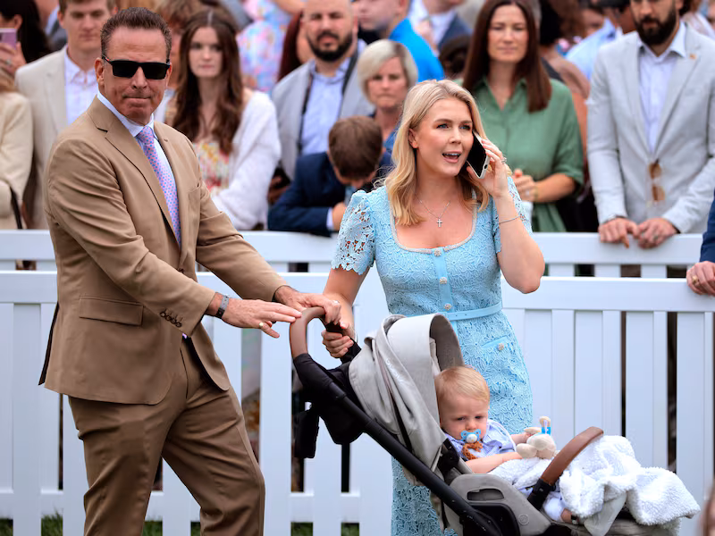 WASHINGTON, DC - APRIL 21: White House Press Secretary Karoline Leavitt and her husband Nicholas Riccio arrive to the White House Easter Egg Roll on the South Lawn of the White House on April 21, 2025 in Washington, DC. The White House said they are expecting thousands of children and adults to participate in the annual tradition of rolling colored eggs down the White House lawn, a tradition started by President Rutherford B. Hayes in 1878. (Photo by Chip Somodevilla/Getty Images)