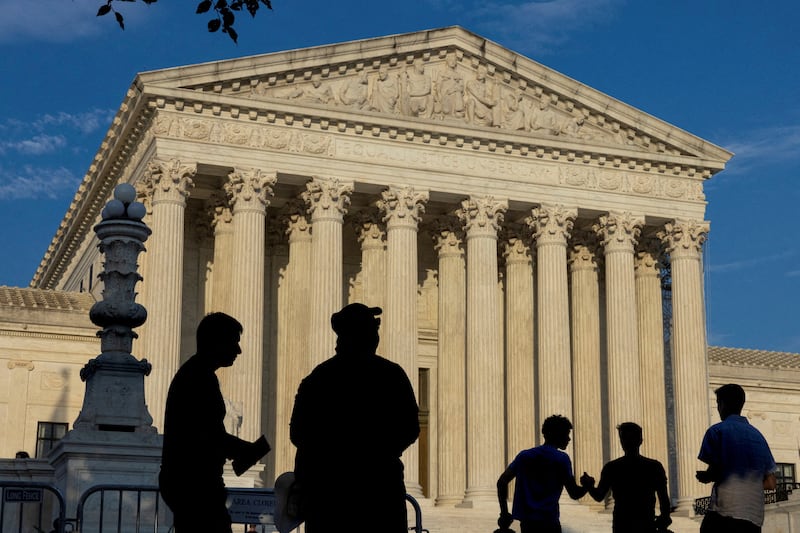 People gather outside the U.S. Supreme Court in Washington, U.S., June 29, 2024.