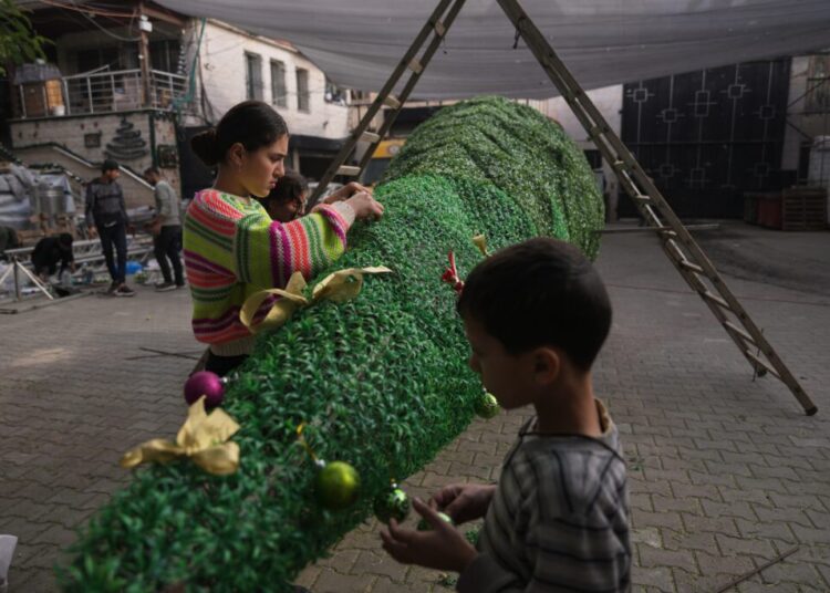 Gaza’s Christians, battered by war, celebrate first Christmas in 3 years