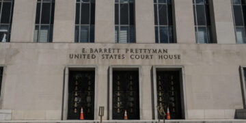 Noem, in a defiant court filing, offers few details on migrant flights to El Salvador