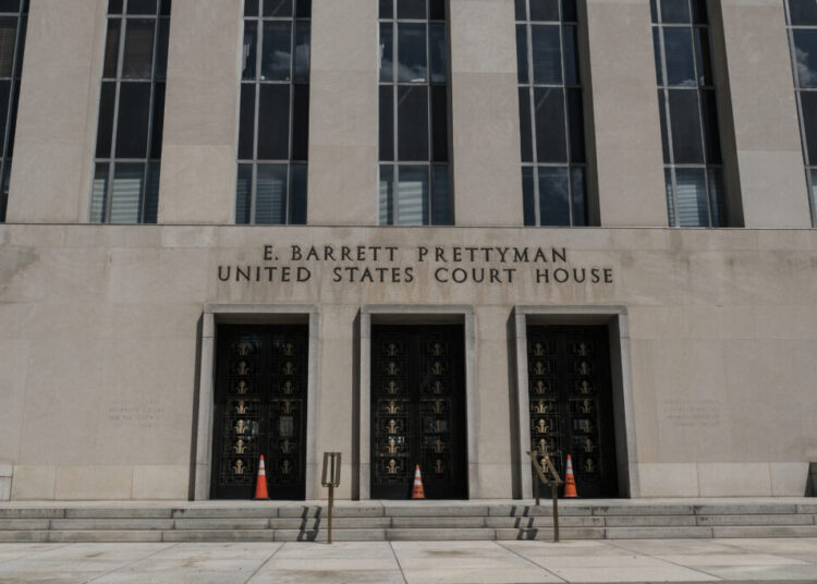 Noem, in a defiant court filing, offers few details on migrant flights to El Salvador