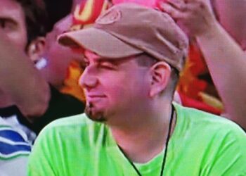The Mystery Behind WWE’s Green Shirt Guy Is Finally Solved