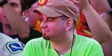 The Mystery Behind WWE’s Green Shirt Guy Is Finally Solved