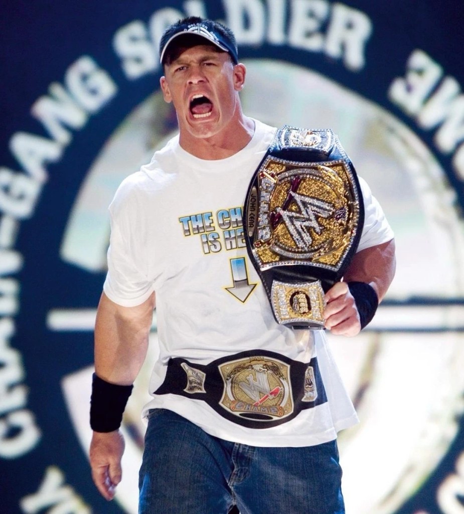 John Cena wearing a shirt that reads :