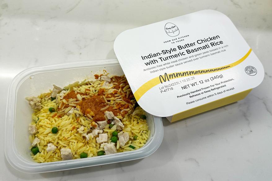 A container of rice and chicken