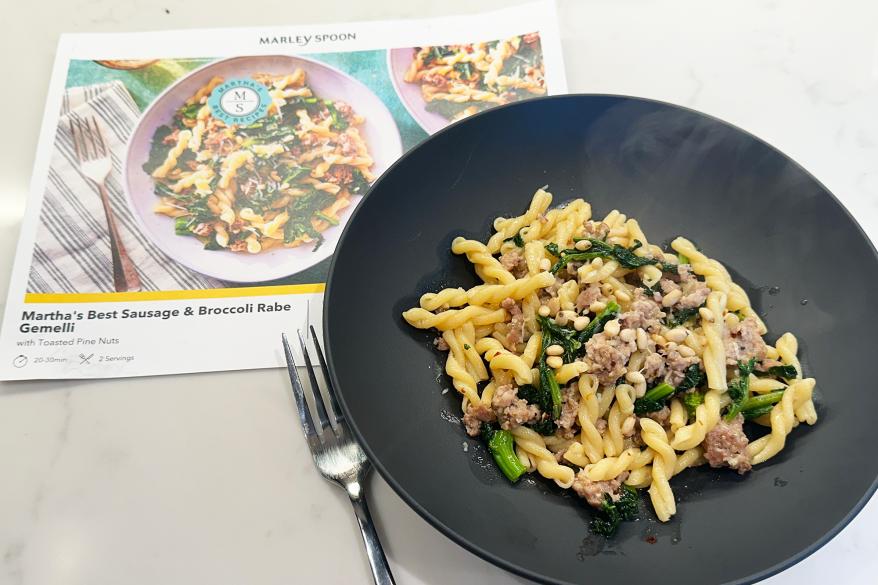 A plate of pasta with a fork