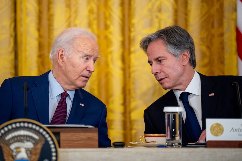 WASHINGTON, DC - APRIL 11: U.S. President Joe Biden speaks with Secretary of State Antony Blinken (R) during a trilateral meeting with Japanese Prime Minister Fumio Kishida and Filipino President Ferdinand Marcos in the East Room of the White House on April 11, 2024 in Washington, DC. Leaders from the three nations are meeting in a first-ever trilateral summit in a show of solidarity as China's assertiveness in the South China Sea has raised tensions in the region. (Photo by Andrew Harnik/Getty Images)