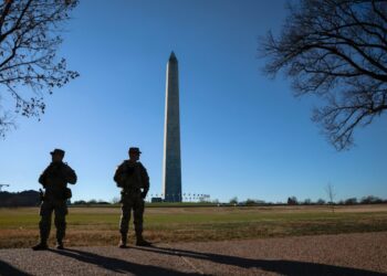 Alleged National Guard shooter makes first court appearance from hospital bed