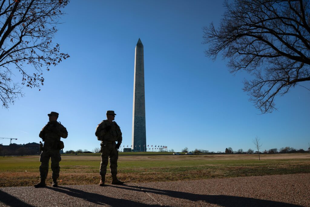 Alleged National Guard shooter makes first court appearance from hospital bed