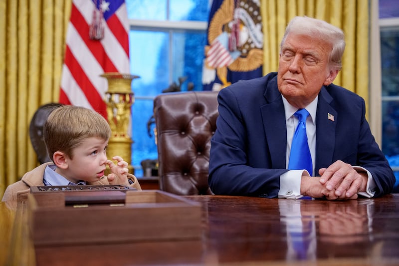X Musk, the son of Tesla and SpaceX CEO Elon Musk, stands next to U.S. President Donald Trump during an executive order signing in the Oval Office at the White House on February 11, 2025 in Washington, DC. Trump is to sign an executive order implementing the Department of Government Efficiency's (DOGE) 
