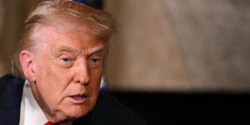 Trump, 79, Slathers On His Trusty Hand Makeup for the Holidays