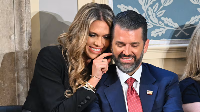Donald Trump Jr. (R) sits with Bettina Anderson ahead of US President Donald Trump's address to a joint session of Congress in the House Chamber of the US Capitol in Washington, DC, on March 4, 2025.