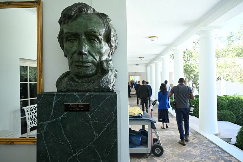 View of a newly-installed bust of former president Abraham Lincoln in the West Wing colonnade at the White House in Washington, DC, on September 2, 2025. From a gold-plated White House to a grandiose revamp for the capital Washington, Donald Trump is trying to leave an architectural mark like no American president has attempted for decades. (Photo by SAUL LOEB / AFP) (Photo by SAUL LOEB/AFP via Getty Images)