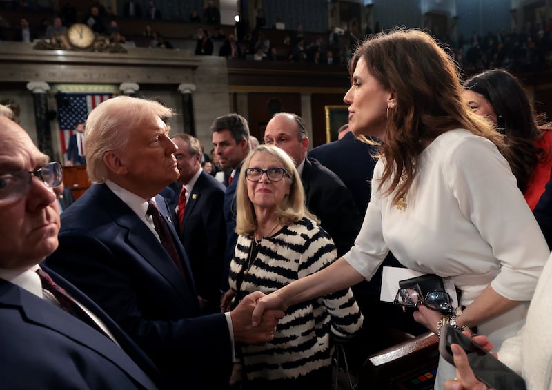 President Donald Trump shakes hands with Rep. Nancy Mace after addressing a joint session of Congress at the U.S. Capitol. Mace’s blistering guest essay made no mention of the president’s leadership.