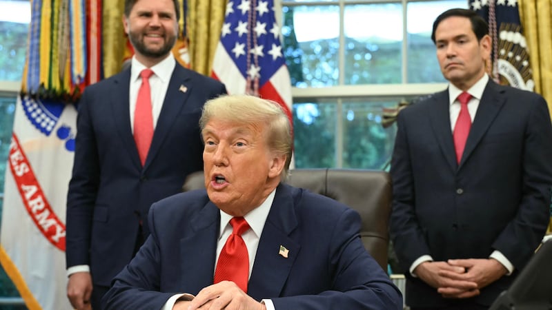 President Donald Trump is flanked by Secretary of State Marco Rubio and Vice President JD Vance (L) during a meeting in the White House in Washington, D.C. on June 27, 2025.