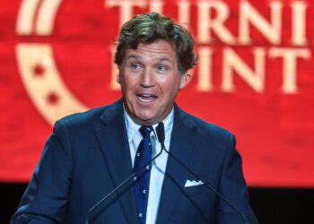 Tucker Carlson Met With Awkward Silence on Stage From MAGA Crowd