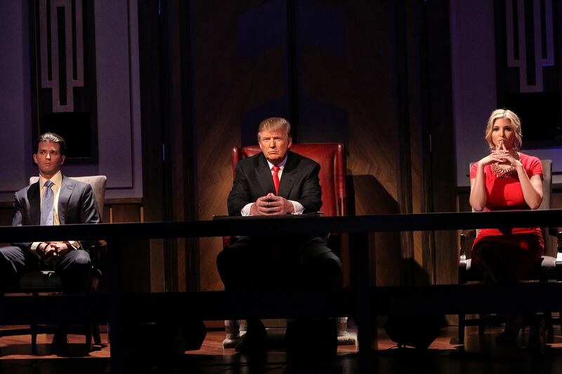 Donald Trump, Jr, Donald Trump, and Ivanka Trump during the Celebrity Apprentice season finale on May 16, 2010 in New York City.