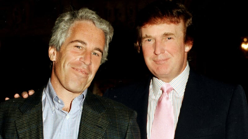 Jeffrey Epstein and Donald Trump as they pose together at the Mar-a-Lago estate, Palm Beach, Florida on February 22, 1997.