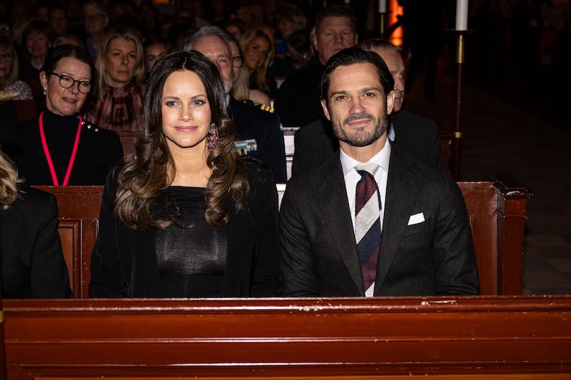 STOCKHOLM, SWEDEN - DECEMBER 20: Princess Sofia and Prince Carl Philip of Sweden attend the "Christmas In Vasastan" concert at Gustaf Vasa Church on December 20, 2024 in Stockholm, Sweden.