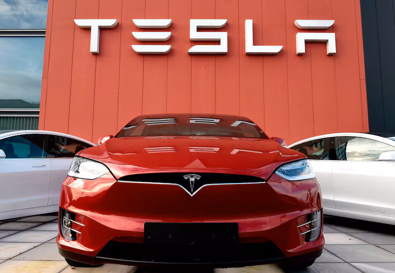 The logo marks the showroom and service center for the US automotive and energy company Tesla in Amsterdam