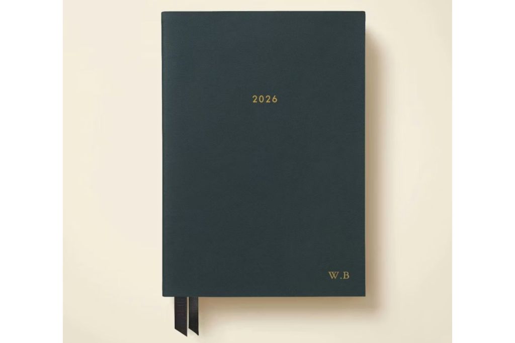 A black leather planner