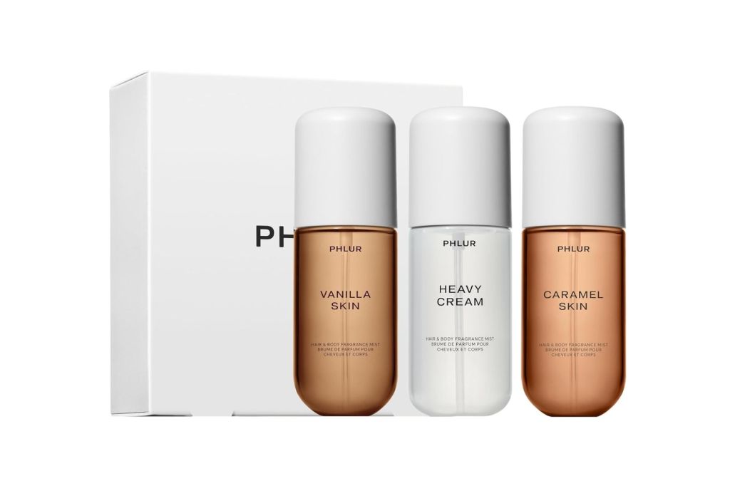A three-set of Phlur body sprays, and their packaging.