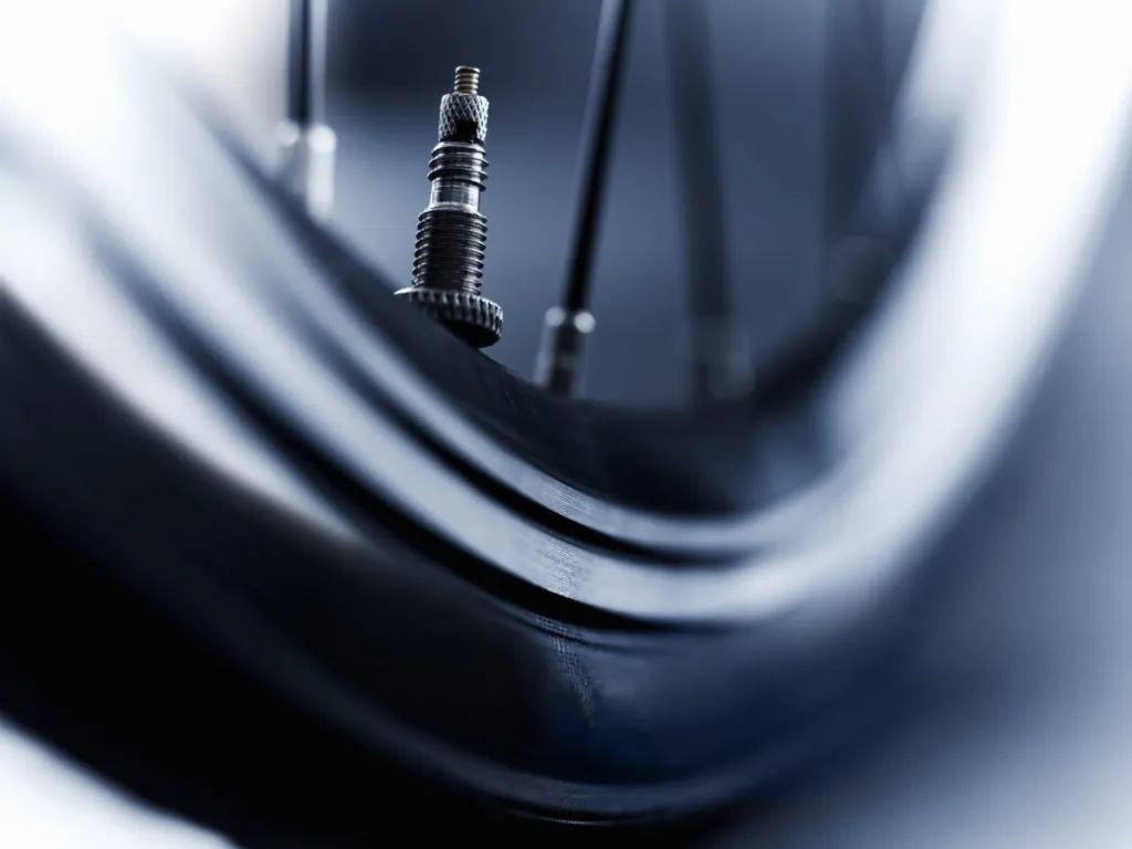 Close up of bicycle tire air valve