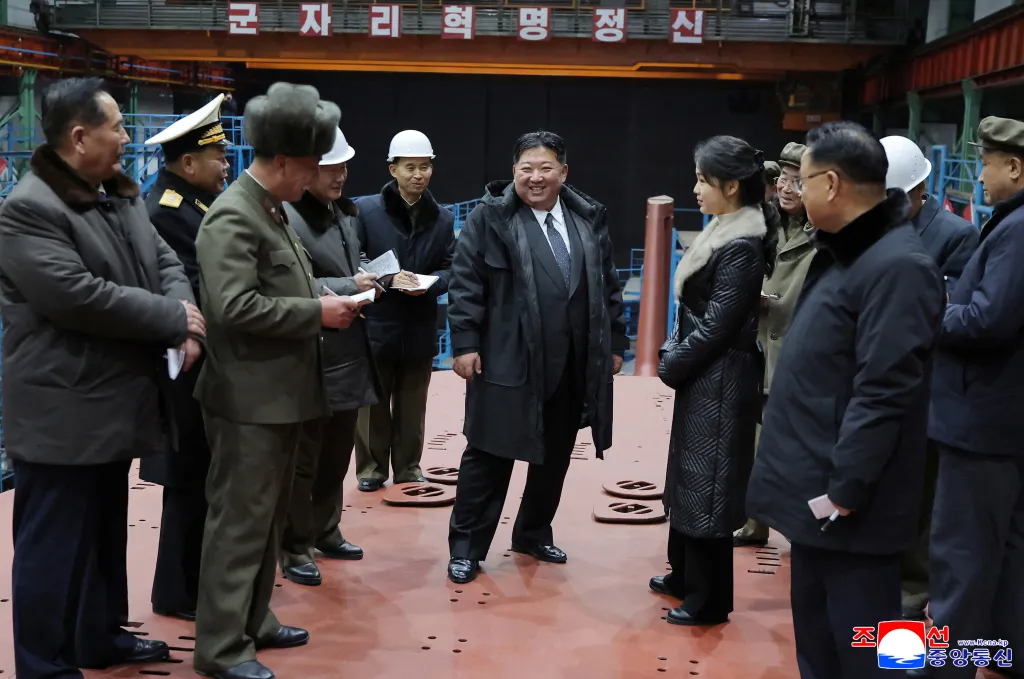 North Korean leader Kim Jong Un visits the construction site of an 8,700-ton nuclear-powered submarine capable of launching surface-to-air missiles