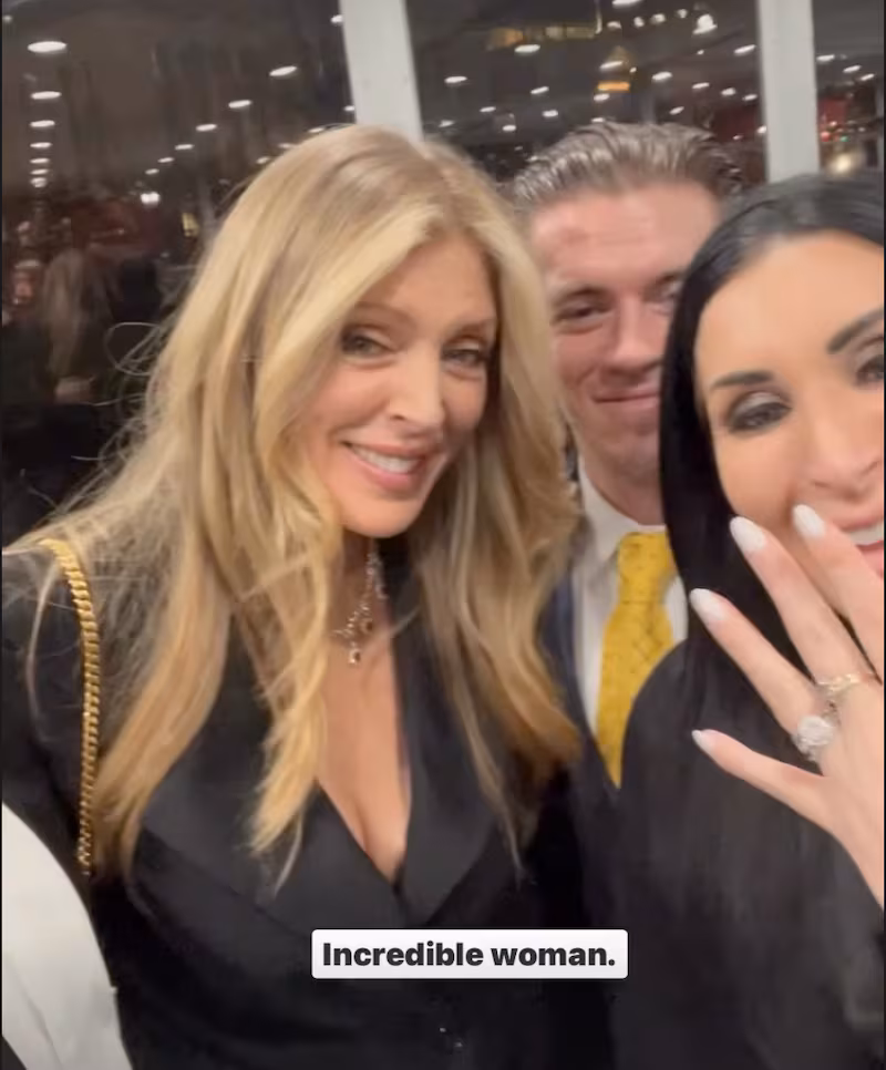 President Donald Trump’s ex-wife, Marla Maples, smiles next to Laura Loomer and her mystery fiancé. Her nails appear freshly done, and her engagement ring is visible.