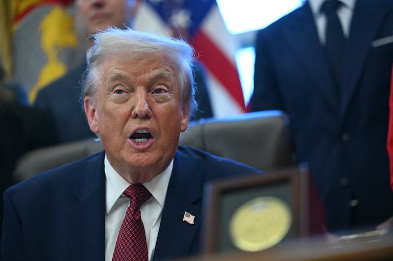 Donald Trump makes an announcement from the Oval Office of the White House in Washington, DC on December 3, 2025.