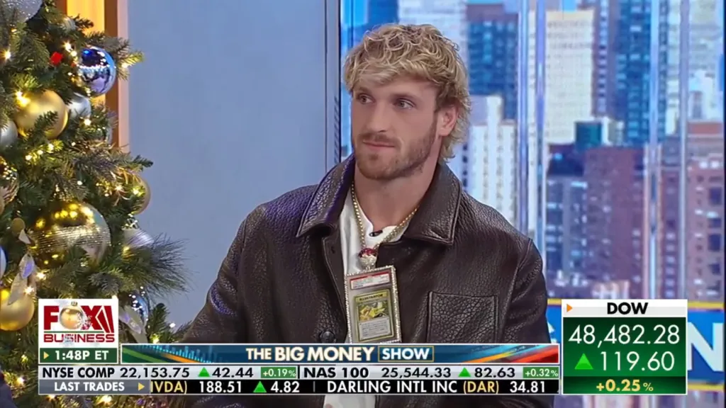 Logan Paul on Fox Business wearing a rare Pikachu Illustrator Pokémon card as a necklace.