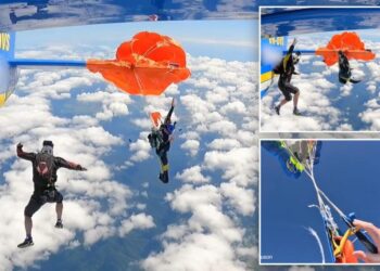 Heart-stopping moment skydiver’s parachute gets hooked on plane’s tail — leaving him dangling 15,000 feet in the air