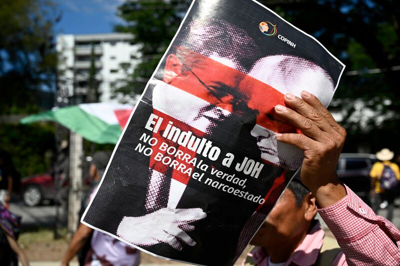 A poster of Juan Orlando Hernandez and Donald Trump