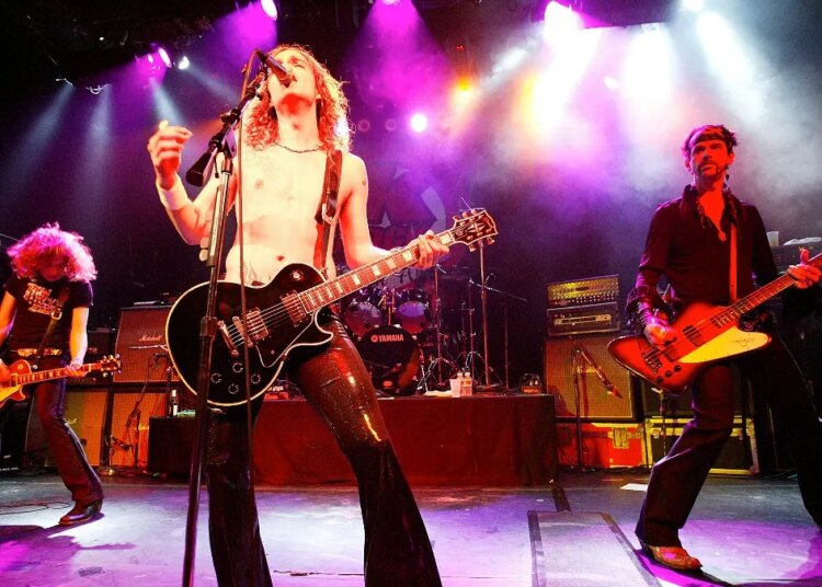 How the Darkness Crafted Their Ideal Christmas Song With the Help of Fairy Lights and Holiday Jumpers