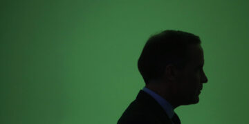 Oil executives once booed Canada’s prime minister. Now they cheer him.